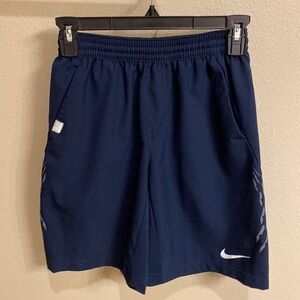 Dark blue Nike shorts w silver accents